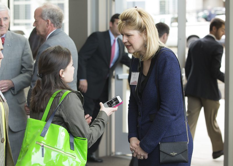 Incoming Furman President Elizabeth Davis speaking with a student