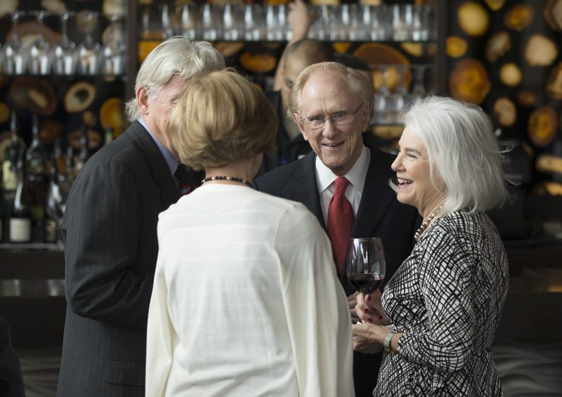 Terry and Scott Peterson talking with Harry and Alvena Chapman