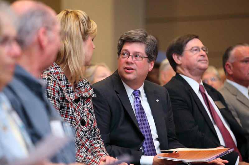 (-r) Furman's President Elizabeth Davis and her husband Charles Davis, and Don Gordon