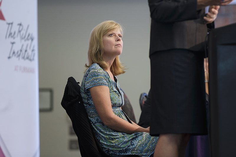 Kristy Maher listening to Hollman's address