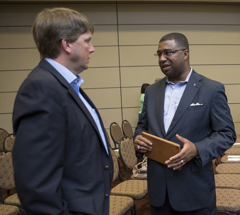 Russell Booker continuing the conversation with a guest