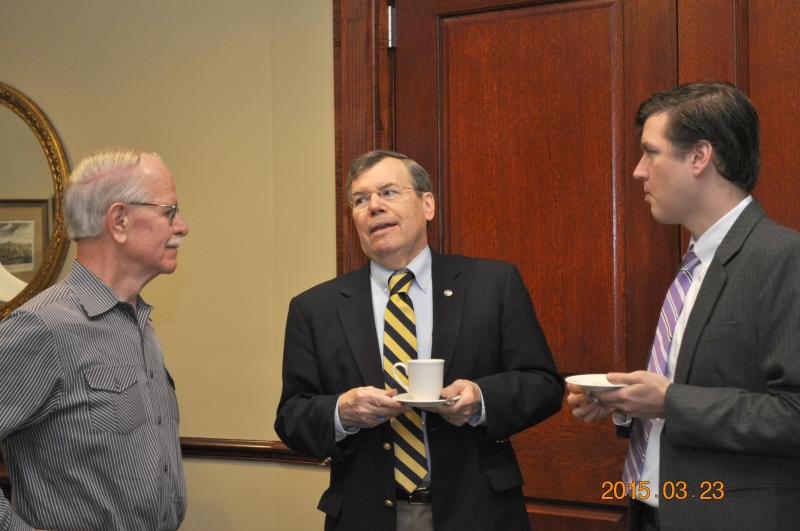 Dr. Musil meets with members of Furman faculty