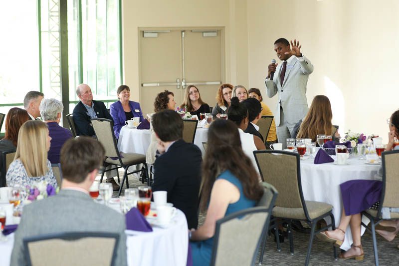 Maurice Owens '00 sharing stories with the students about himself