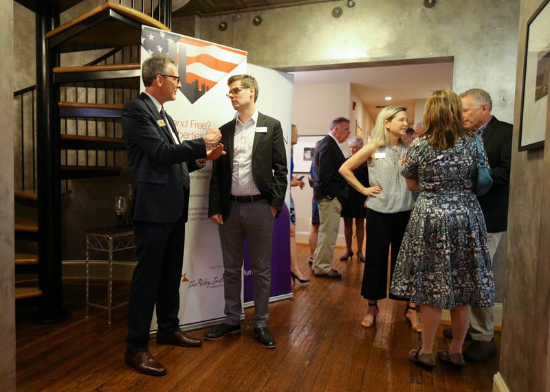 Guests gathering for the welcoming dinner held at Soby's Loft