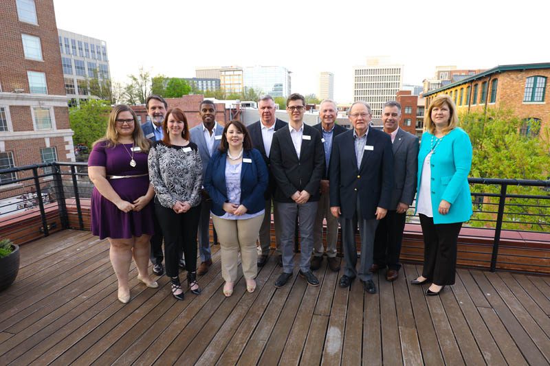 Row 1 (l-r) Jennifer Lambert '01, Sheana Cavitt '04, Jessica Taylor '07, Eli Dourado '02, Mike McConnell '66; Row 2 (l-r) Mike Roosevelt '81, Maurice Owens '00, John Mulholland '78, David Shi '73, Chris Ballard '84 and Elizabeth Davis