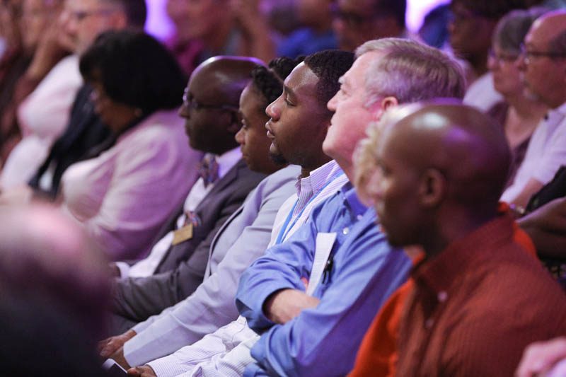 The audience intently listening to every word