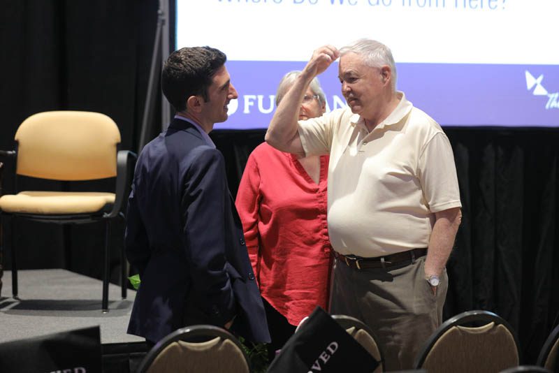 Alexios Mantzarlis speaking with guests