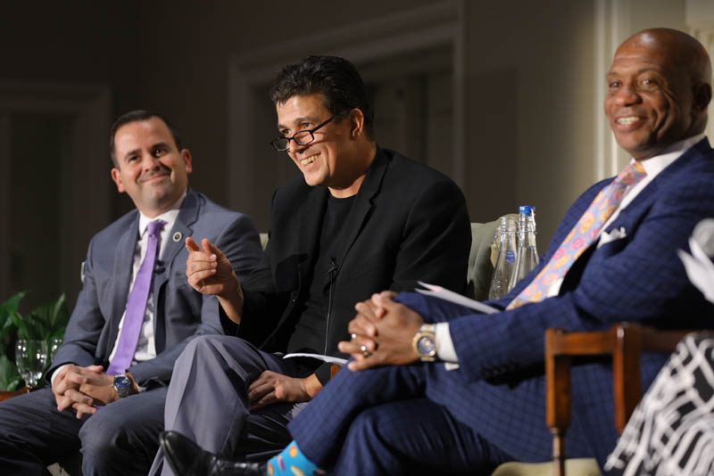 (l-r) Neal Collins, Akan Malici speaking and Garry McFadden