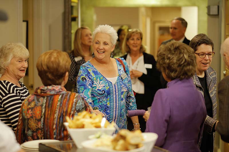 Deborah Malac ’77 is greeted by Barbara Block, Susan Shi and Betty Farr