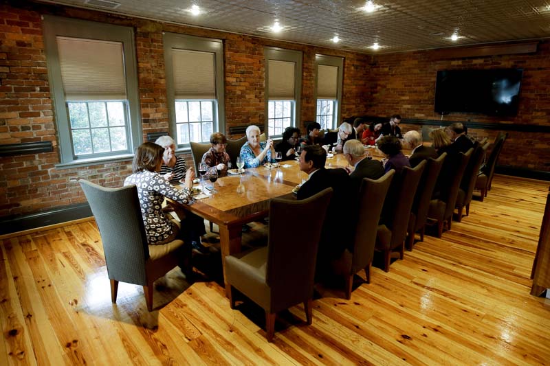 Speakers and guests enjoying a delicious dinner
