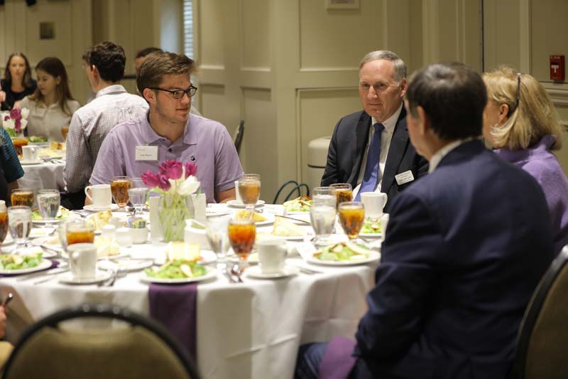 Evan Myers with guest speaker Eric Spitler ’81