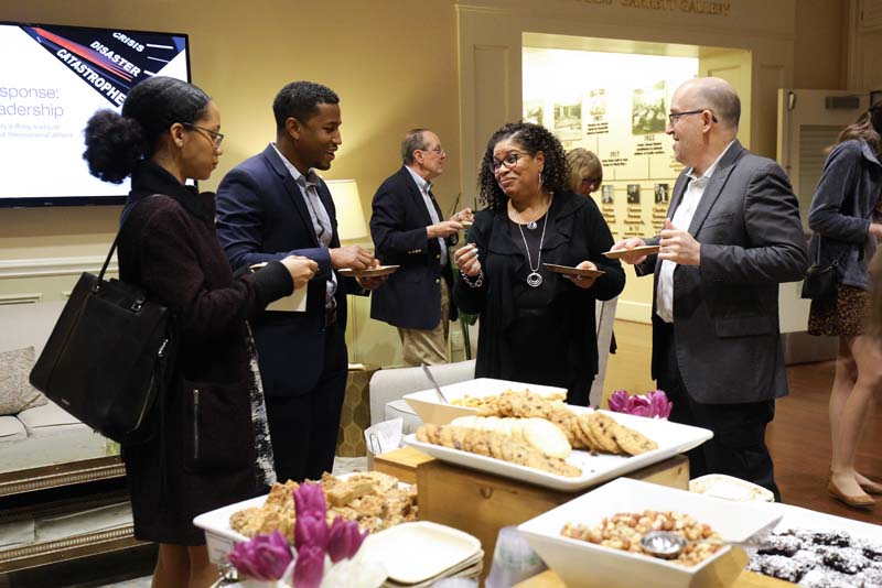 Teresa Cosby, Associate Professor, Politics and International Affairs, and Glen Halva-Neubauer, Dana Professor of Politics and International Affairs, Director, Mock Trial and Public Service Internship Programs, speaking with Jason and Casey Terrell