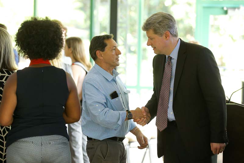 Andy Rudalevige speaking with a guest