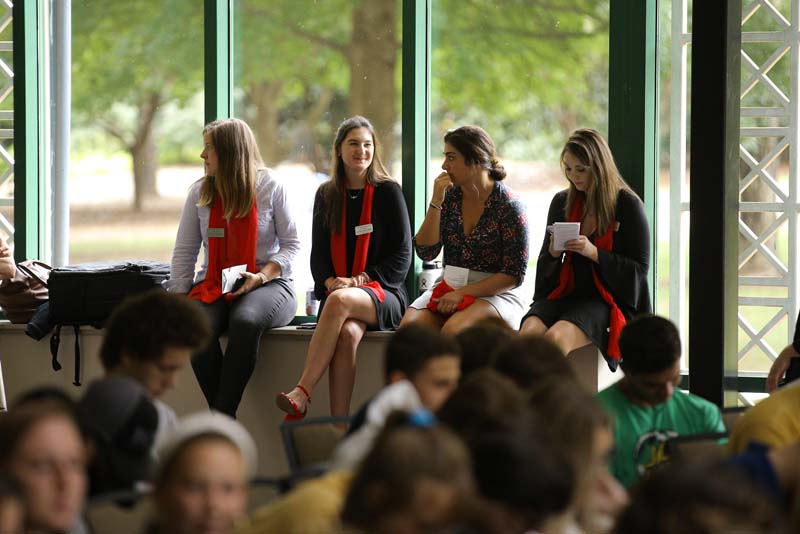 Advance Team members seated on windowsill: Grace Guynn ('20), Caroline Ring ('21), Emily Zeytoonjian ('20), and Marlies Bronner ('20)