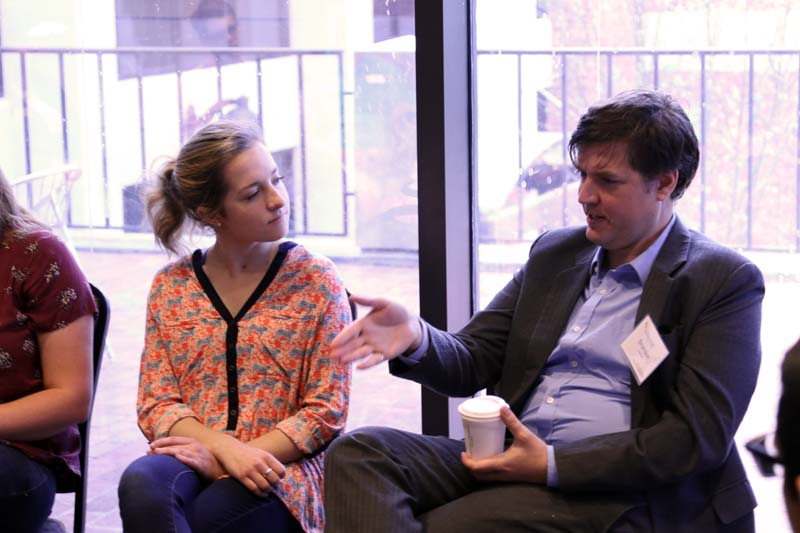 Brandon Inabinet, associate professor of Communication Studies, hosting the discussion