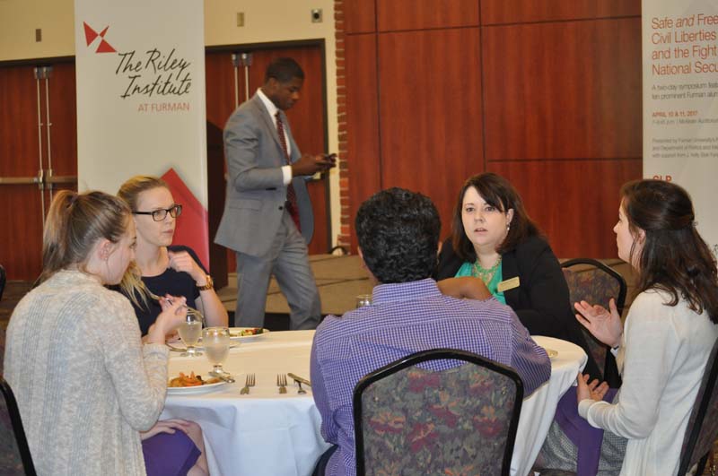 Alumni having lunch with Advance Team