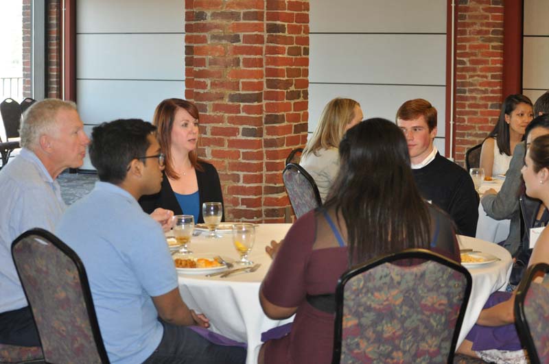 David Shi, tenth Furman president and historian, Furman class of 1973 and Sheana Cavitt, Furman class of 2004, senior professional, Johns Hopkins University Applied Physics Lab, speaking with Advance Team members