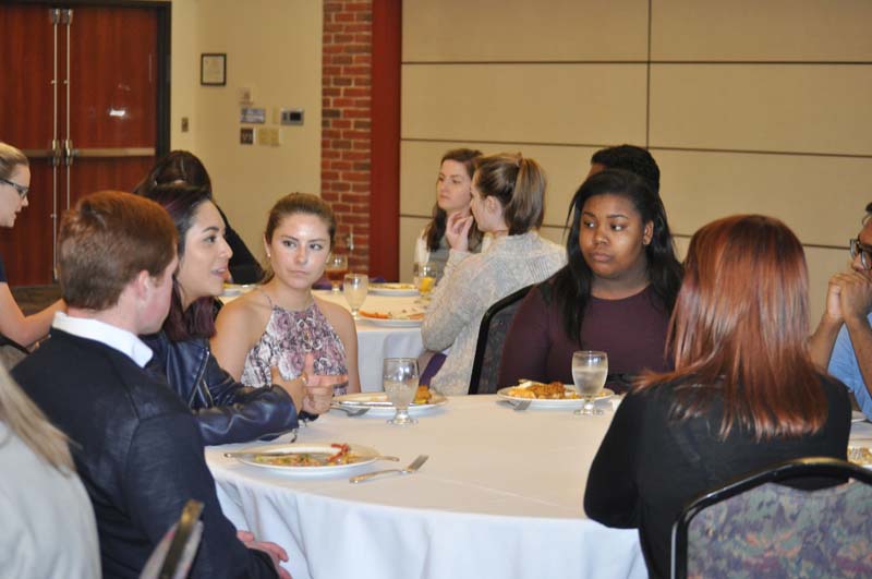 Advance Team members interacting with alumni