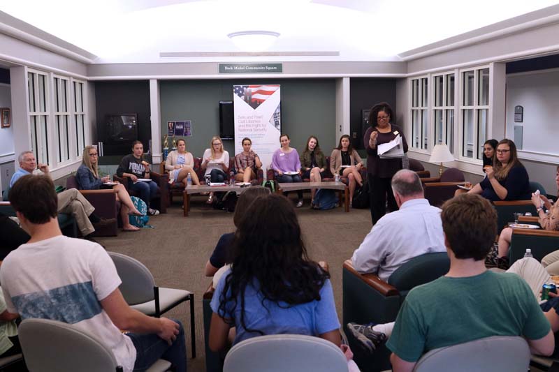 Pizza & Politics: introductions by Teresa Cosby, associate professor, Politics and International Affairs