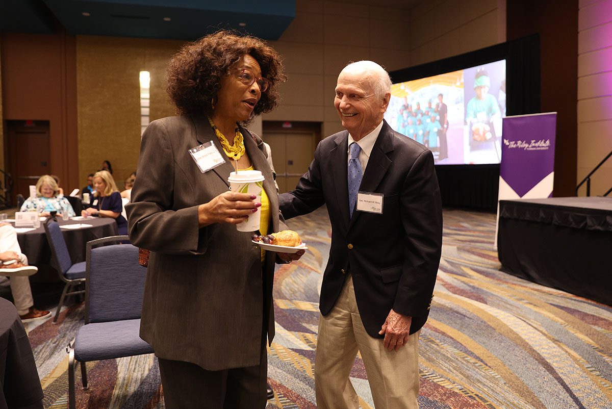The Hon. Lillian Brock Flemming joins Sec. Dick Riley in conversation before the event.