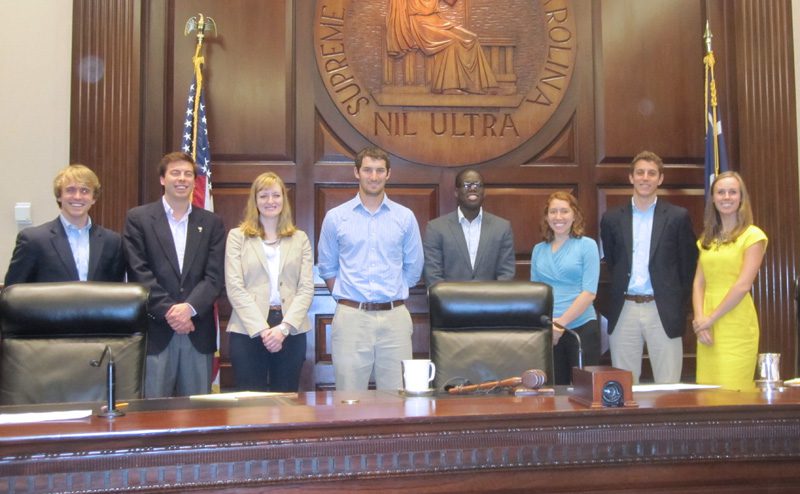 (l-r) Thomas Hydrick, Ben Saul, Amanda Michalski, Alex Abrams, Ekow Bartels-Kodwo, Emily Vontsolos, Miller DeVenny, and Lee Bolton at the SC State Supreme Court