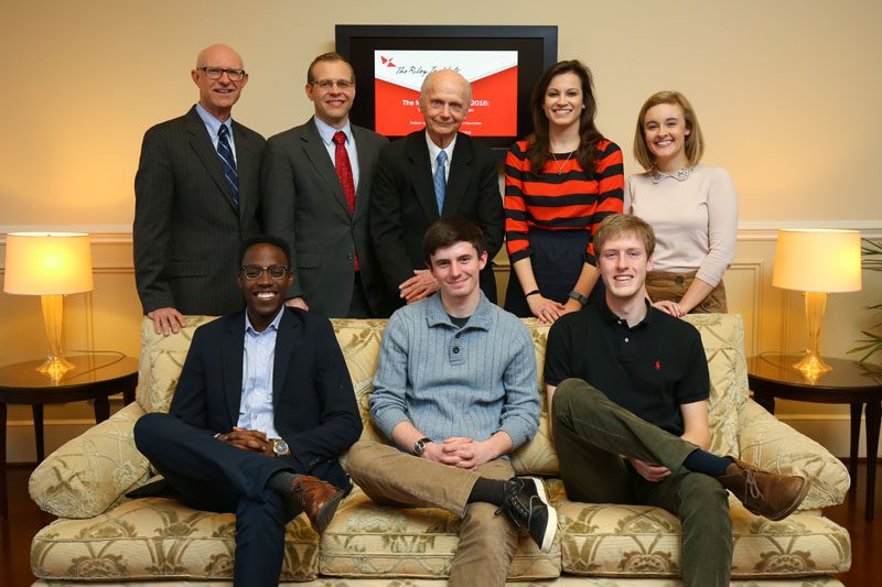The APEC group pictured with Secretary Riley. Top: (from left) Dr. Cleve Fraser, Dr. Jason Jones, Secretary Riley, Mallary Taylor, Gray Johnson. Bottom: (from left) Jonathan Kubakundimana, Matthew Deininger, Nathan Thompson