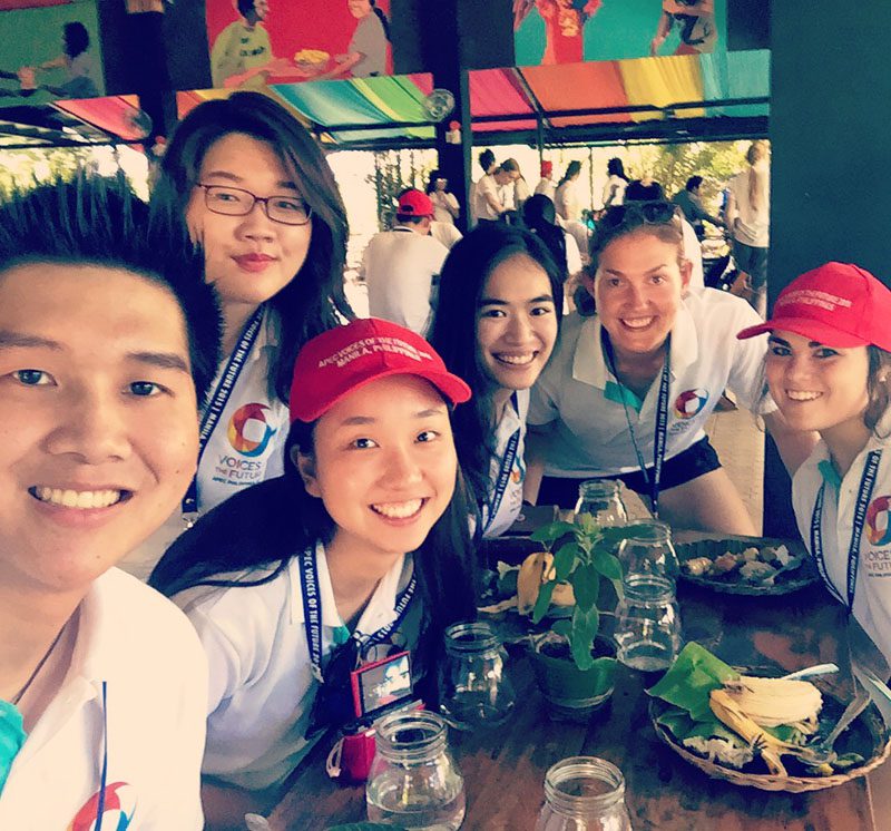 Student Kelsey Orr (right) is pictured with students from other member economies at Gawad Kalinga