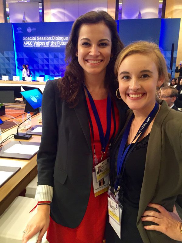 Students Mallary Taylor and Gray Johnson get ready for the session with the APEC Business Advisory Council.
