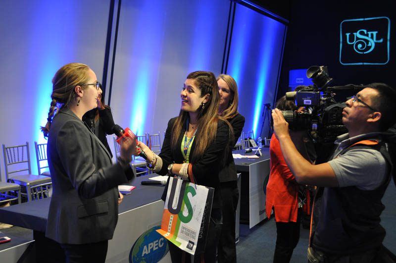 Emilee O'Brian being interviewed at the opening ceremony