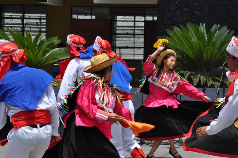 Students from the Escuela de Talentos performing the Peruvian traditional dance to welcome the APEC Voices delegates during their visit to the school in Callao, Peru.