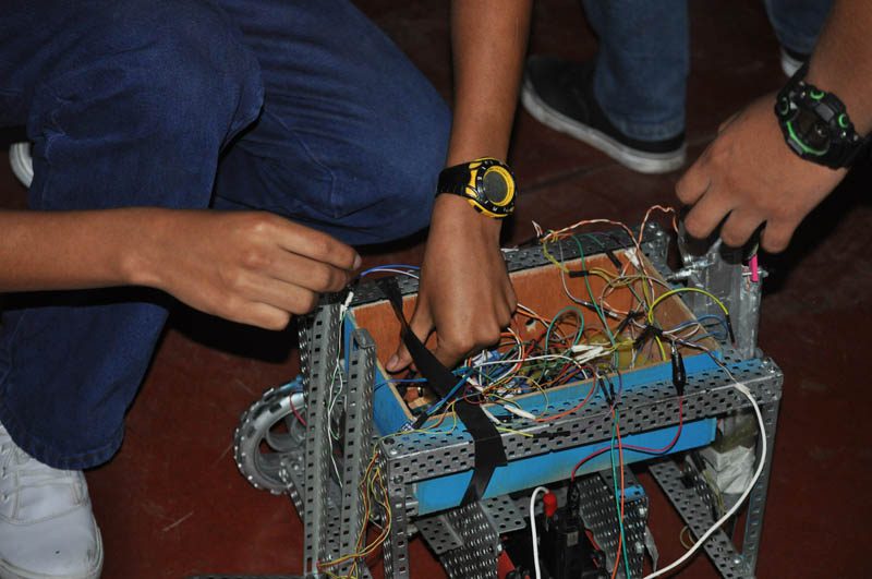 The students from the Escuela de Talentos demonstrating technology they have learned at the school