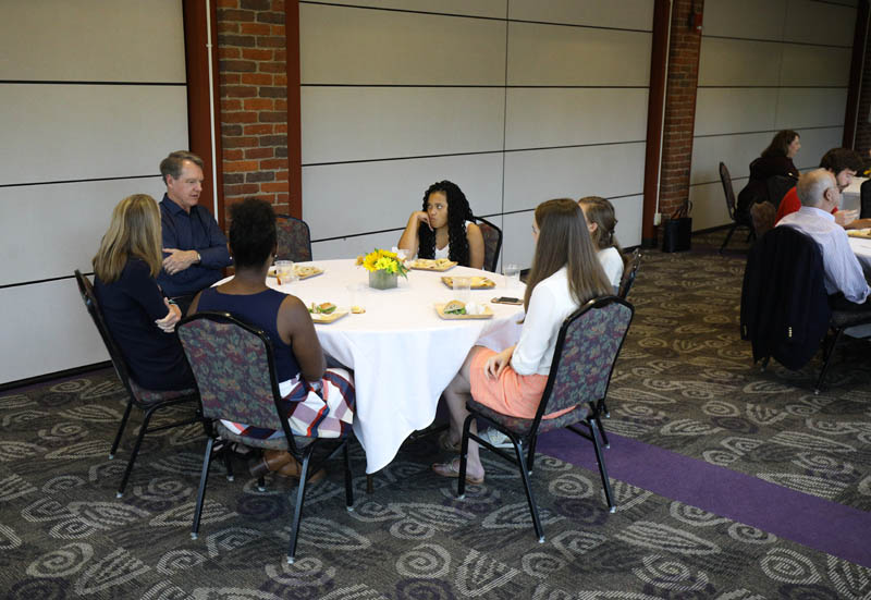 (l-r) Whit Ayres, founder and president, North Star Opinion Research and speaker at StraightTalk 2018, sharing a story with Jill Fuson, Shekinah Lightner (’20), Hannah Warren (’19), Becca Colehower (’20) and Alexis Wood (’20)