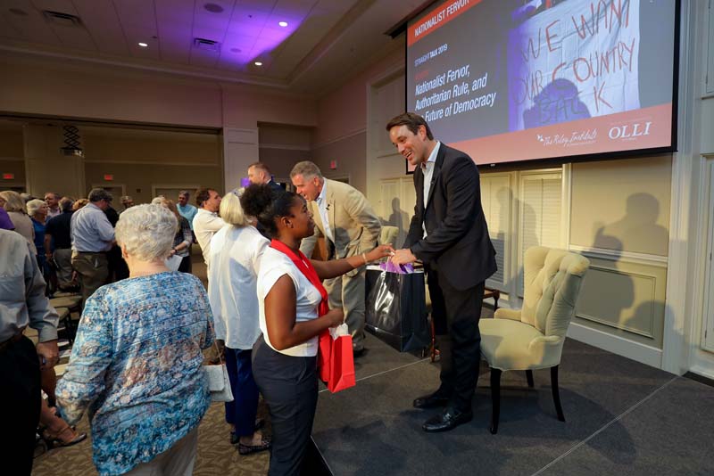 StraightTalk 2019: Advance Team member Shekinah Lightner presenting a gift to Bart Bonikowski